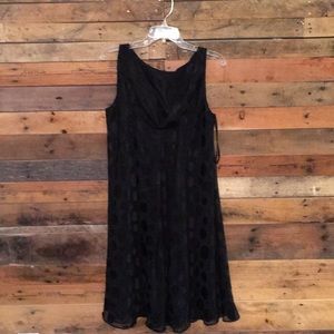 Sleeveless flowing black dress